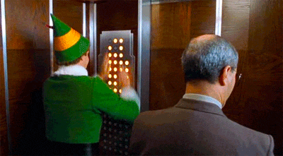 Elf in lift pressing all buttons