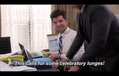 A Parks and Rec character doing lunges by a desk