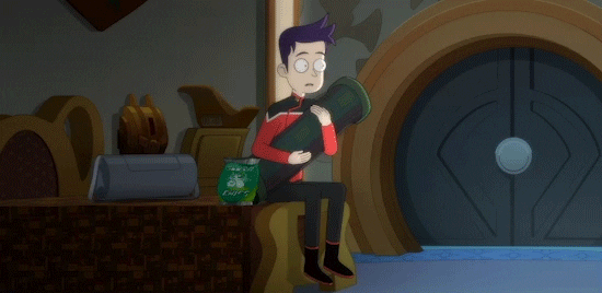 boimler snacking while engrossed into a ferengi cartoon