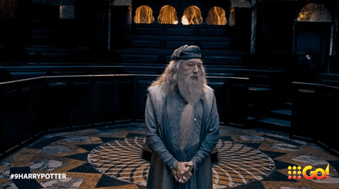 Dumbledore putting his hands on his waist