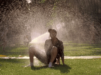 Image result for sitting on sprinkler gif