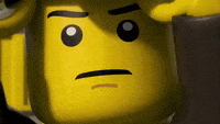 Animated LEGO character rolling up sleeves and getting ready, captioned let's do this
