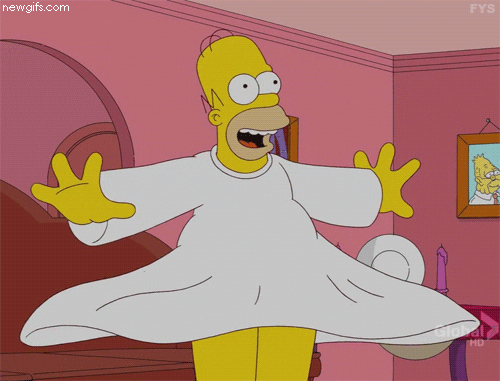 Animated GIF of Homer Simpson twirling in a circle while wearing white dress