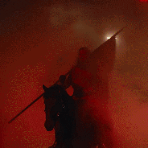 video montage of the red knight charging into the arena, asking for his guests to cheer him on