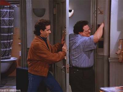 Person trying to close the door before another one enters the apartment. 