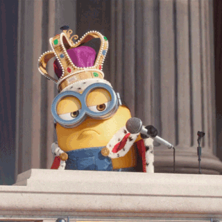 A Quinceanera-themed image of a minion wearing a crown and holding a microphone