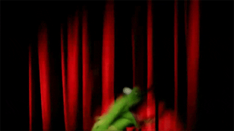 Source: Giphy. Description: Kermit the frog waving his entire body around in excitement.