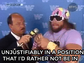 A wrestler being interviewed says "unjustifiably a position I'd rather not be in"