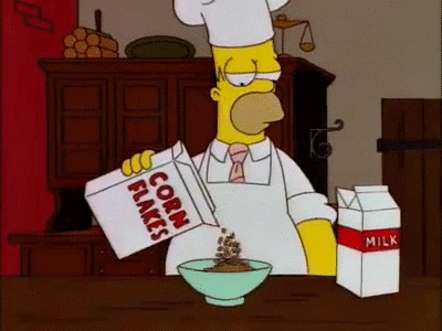 Homer Simpson making a bowl of cereal only for it to burst into flames