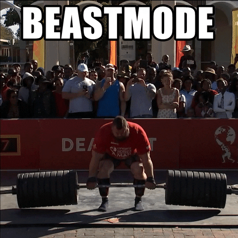 Gif: World's Strongest Man Competition. A man completes a very heavy looking dead-lift. 