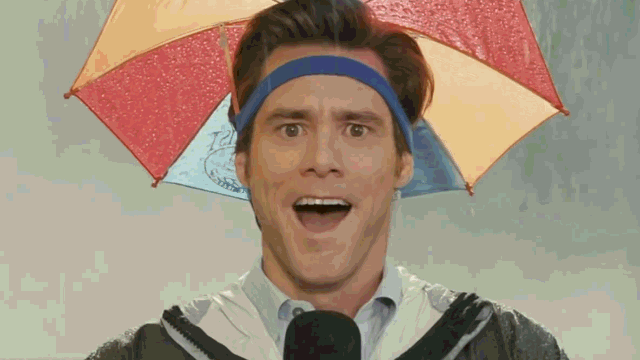 Jim Carrey wearing an umbrella hat in the rain looking overwhelmed