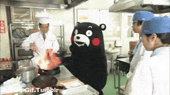 Fake bear excited about cooking