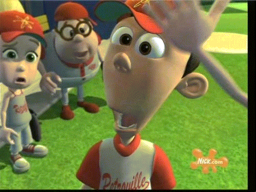 Young boy in baseball cap looking lost and confused with a hand waving in his face 