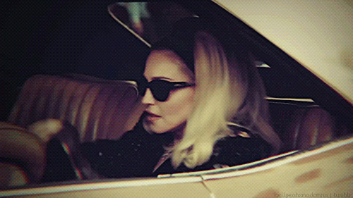 car blonde madonna sunglasses embarrassed