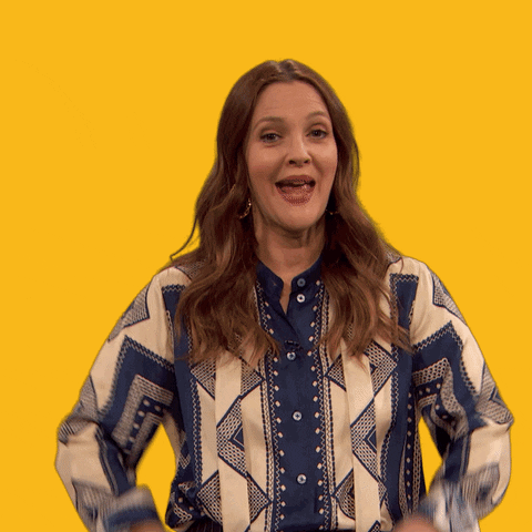 Gif of Drew Barrymore giving two thumbs up