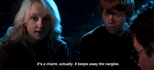 Luna with Harry and Ron: It's a charm, actually, it keeps away the nargles