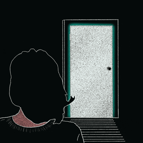A woman in a dark room looks at a door that opens and closes continuously with a shadowy figure on the other side. 