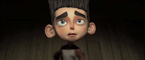 Norman from ParaNorman, looking scared and taking a step back while shaking his head