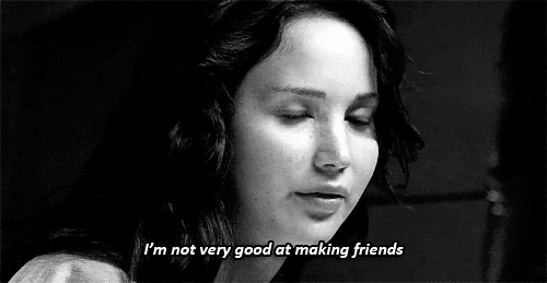 Katniss Everdeen sadly averts her eyes downward and states, "I'm not very good at making friends."