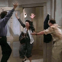  gif of the seinfeld characters dancing excitedly