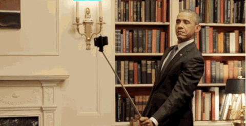  president obama library selfie stick taking a selfie smiling for the camera GIF