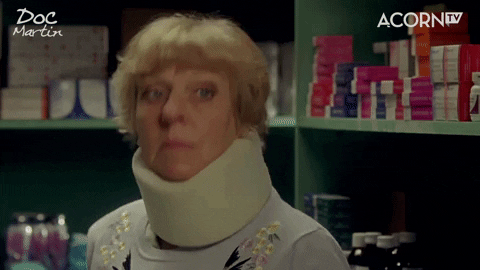 Mrs. Tishell blowing a kiss in her neck brace from the Doc Martin TV show