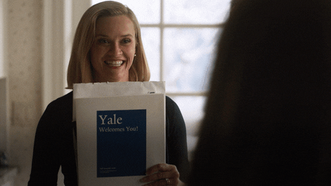 Reese Witherspoon in TV show saying You got in! to daughter