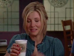GIF of Elliot from "scrubs" saying "PHEW" while holding a coffee