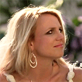 Britney Spears turning towards camera with shocked confused expression