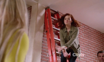 wrestling punch jumping punching suburgatory GIF