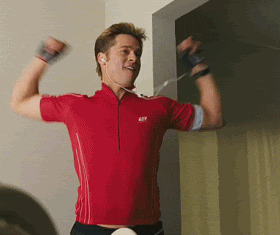 Brad Pitt in a red shirt dancing 