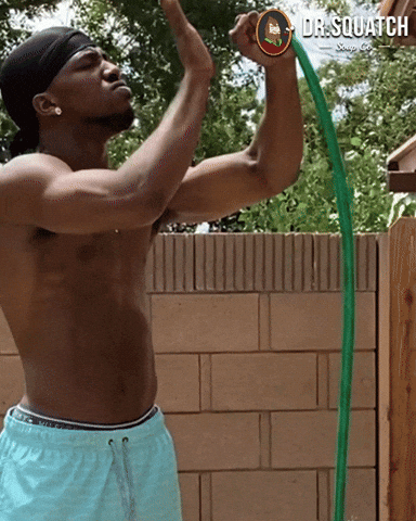 Man examining a clogged hose