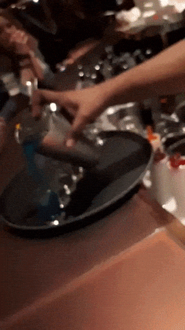 Pouring rainbow drink in wow gifs