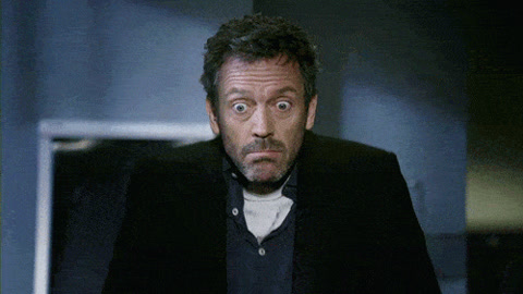 House: Dr. Gregory House stares wide-eyed with pursed lips, clearly unsure.