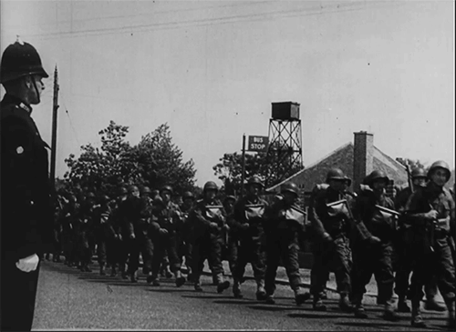 Gif of a military group marching in line.