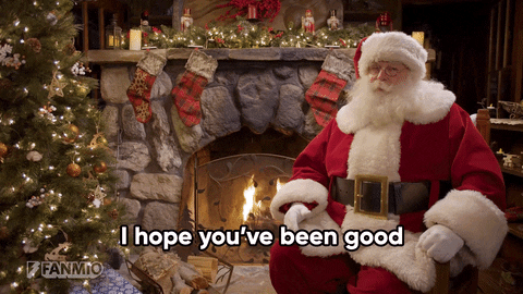 Gif showing Santa sitting in front of a fire saying "I hope you've been good"