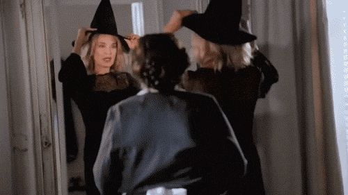 Jessica Lange in 'American Horror Story: Coven'. She's putting on a pointy witch hat and saying, "Who's the baddest witch in town?"