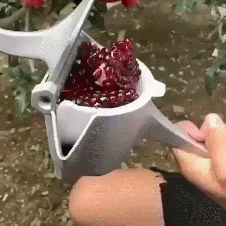 Pomegranate juicer machine in wow gifs