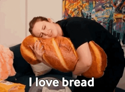 girl hugging bread