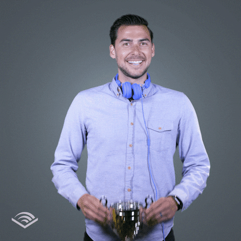 Gif of a man holding up a trophy