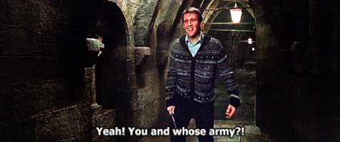 Neville with his arms out saying Yeah! You and whose army?