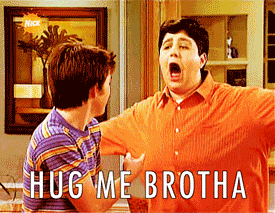 [A boy asks another boy to hug him then proceeds to lift him up in a hug. Words at bottom read "hug me brotha".] Via Giphy