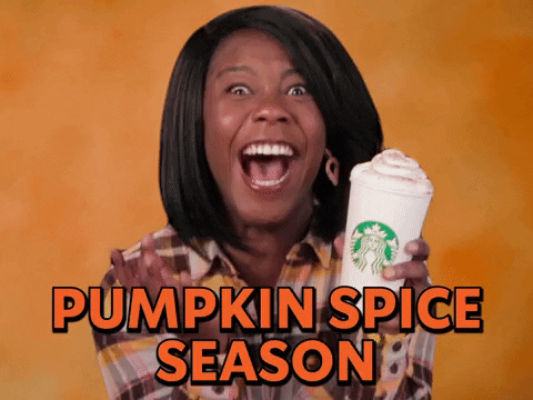 Gif of Black women excited about a pumpkin spice latte