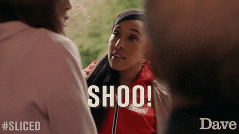 GIF of woman saying "Shoo" from Sliced.