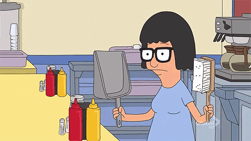Cartoon Girl  brushing her hair and looking into a mirror that is a dustpan