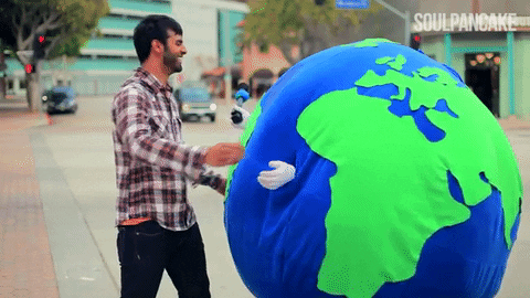 Gif of a man hugging The Earth.