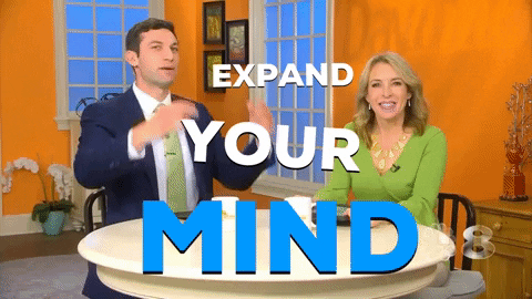 A GIF of two news reporters saying 'Expand Your Mind' via Giphy