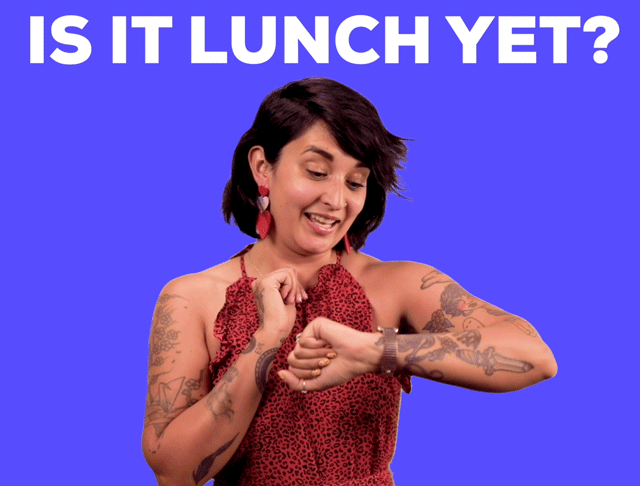 Giphy of person saying is it lunch yet and checking the time