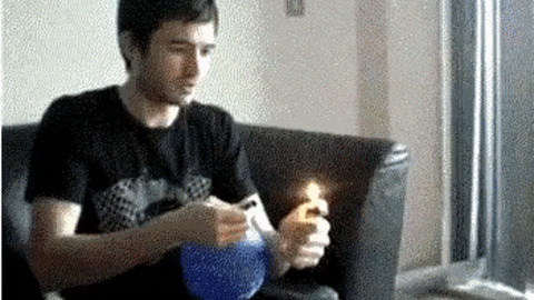 Idiot trying to light up balloon filled with inflamable gas