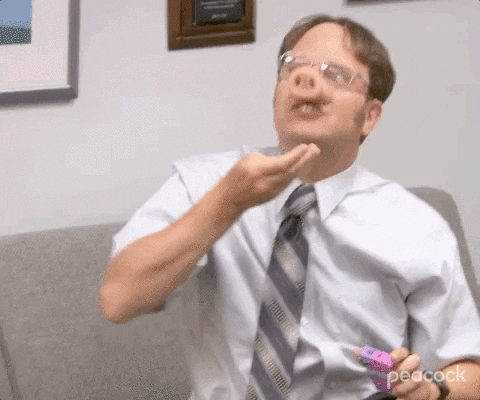 Dwight Schrute wears a pig masks and eats like a pig